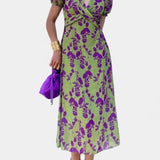 Elara Vestido Maxi con Nudo Frontal y Estampado Floral Delicado