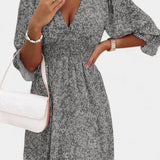 Benicia Vestido Floral de Manga Abullonada con Dobladillo Juguetón