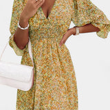 Benicia Vestido Floral de Manga Abullonada con Dobladillo Juguetón