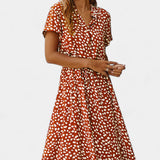 Rovena Vestido Midi de Lunares con Cuello Camisero y Cintura Ajustable